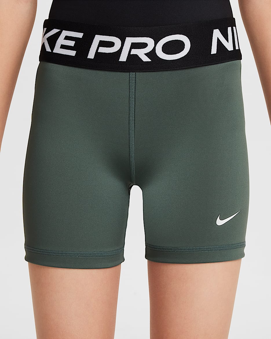 Nike pro green shorts deals